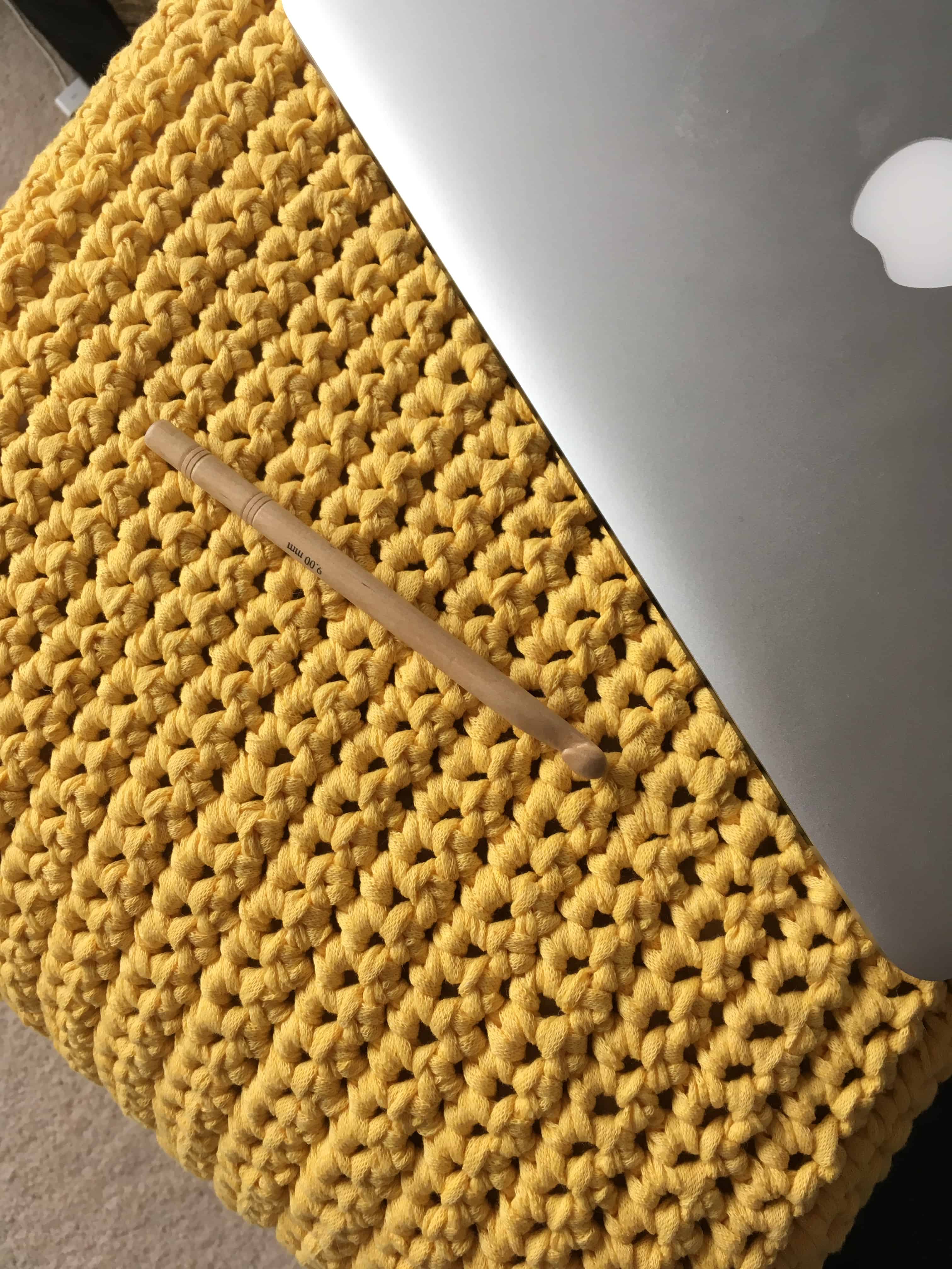 crochet footstool cover with laptop and hook