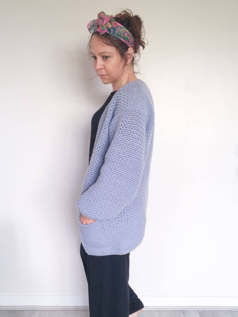 Woman in crochet cardigan