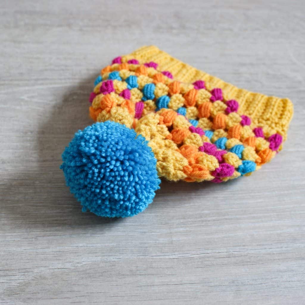 Kids granny stripe crochet hat in yellow blue and pink