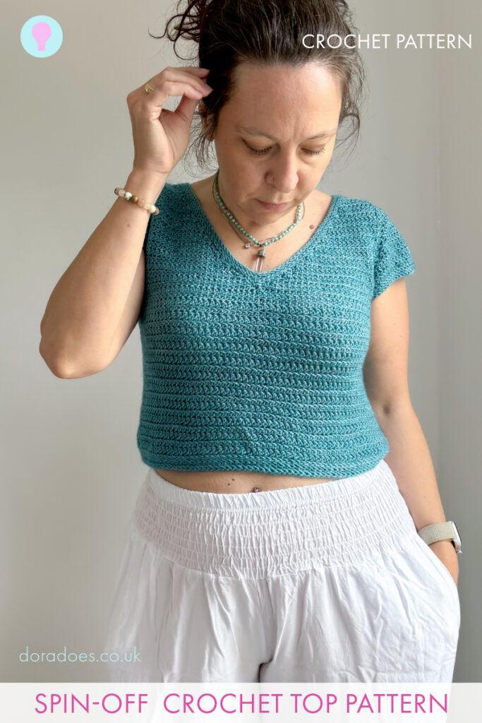 A woman wears a v-neck crochet t shirt made in teal yarn. A text overlay reads: crochet pattern, spin off crochet top pattern.