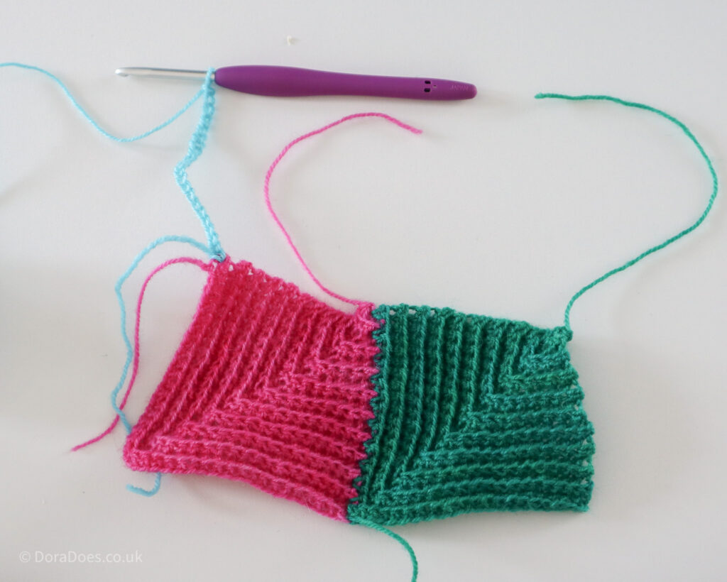 A chain made from turquoise yarn showing where to join and start a third crochet mitred square using the join as you go technique.