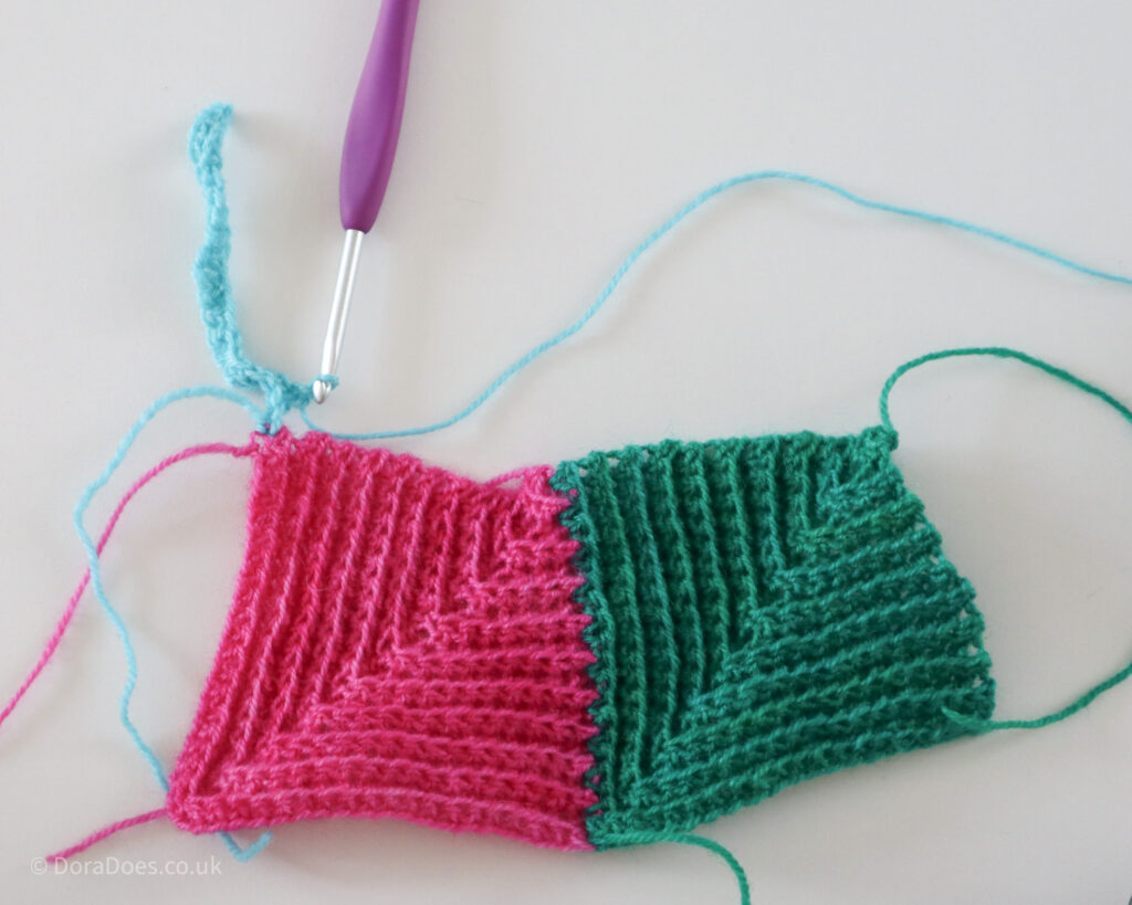 Crochet mitred square step by step joining tutorial showing the first row of the third square.