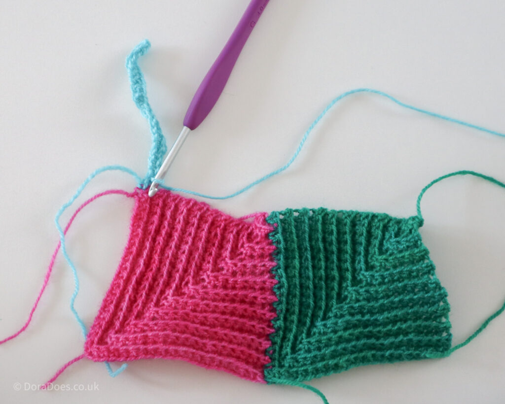 Crochet mitred square step by step joining tutorial showing where to start the second part of the first row on the third square.